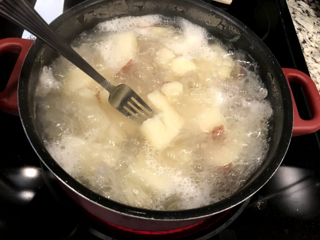 Best Mashed Potato Recipie - TheSumbayHome.com - Fork Testing the potatoes