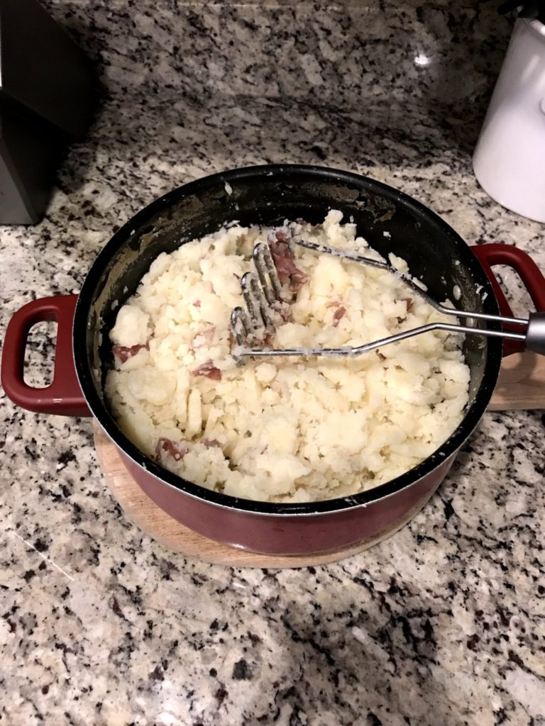 Best Mashed Potato Recipe - TheSumbayHome.com - Mashing potatoes
